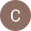 White letter C on a brown circular background with black edges.